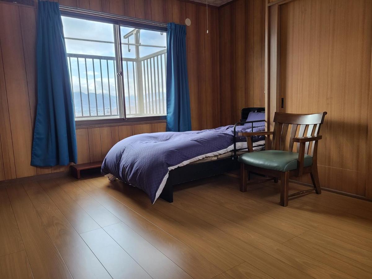 ゲストハウス陽だまりの宿 Hébergement de vacances
